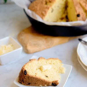 A slice of irish soda bread with butter on it