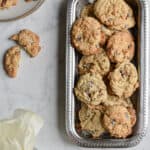 Double chocolate oat cookies laid out on a plate and on a serving dish