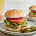 Chicken burgers with feta and spinach served with a beer