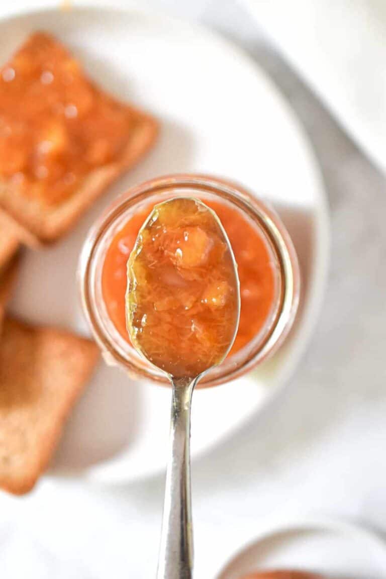 An overhead shot of the Instant Pot Peach Jam on a spoon