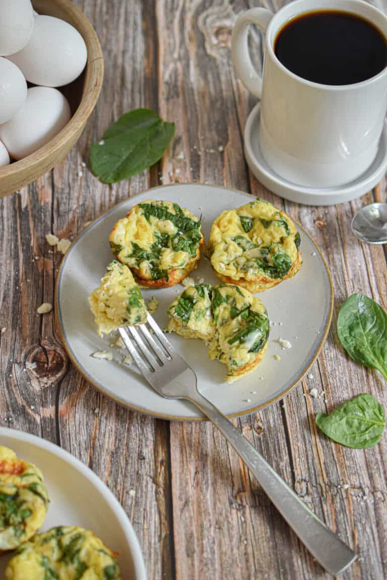 A fork has a piece of the egg bite.