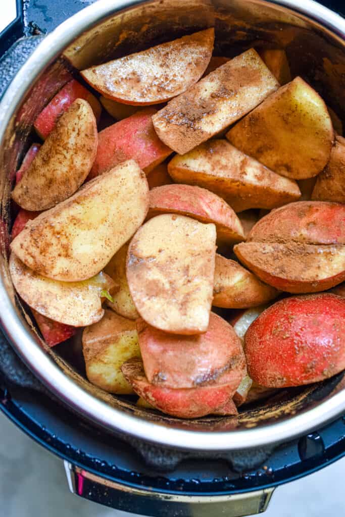 The apples and other ingredients are mixed together in the Instant Pot