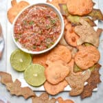 An overhead shot of the chips surrounding a bowl of salsa