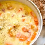 A close up of the Instant Pot Ham and potato soup with no spoon in the bowl