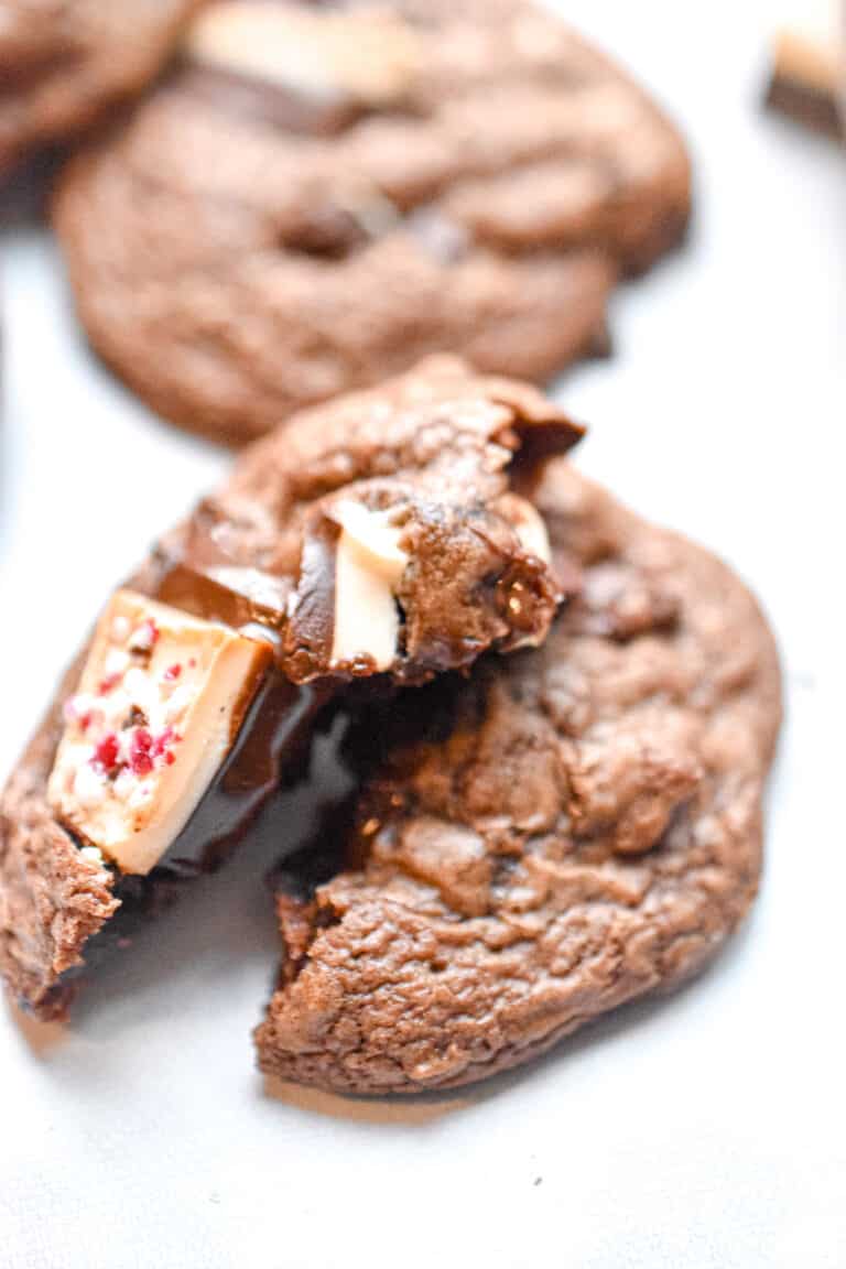 half of a brownie mix cookie is on the other half of the cookie