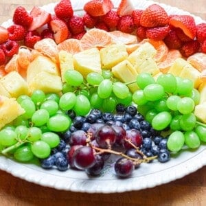 The rainbow fruit platter is done and on an oval platter.