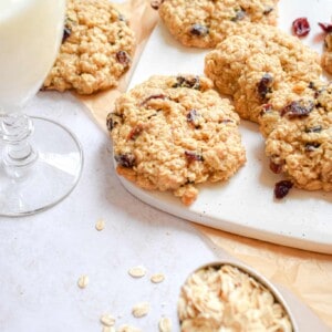 A glass of milk and the oatmeal craisin cookies.