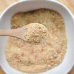A spoon is lifting the sourdough breadcrumbs.