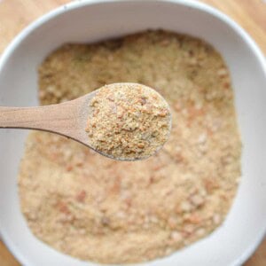 A spoon is lifting the sourdough breadcrumbs.