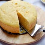A pie server is taking a piece of the Instant Pot Cornbread.