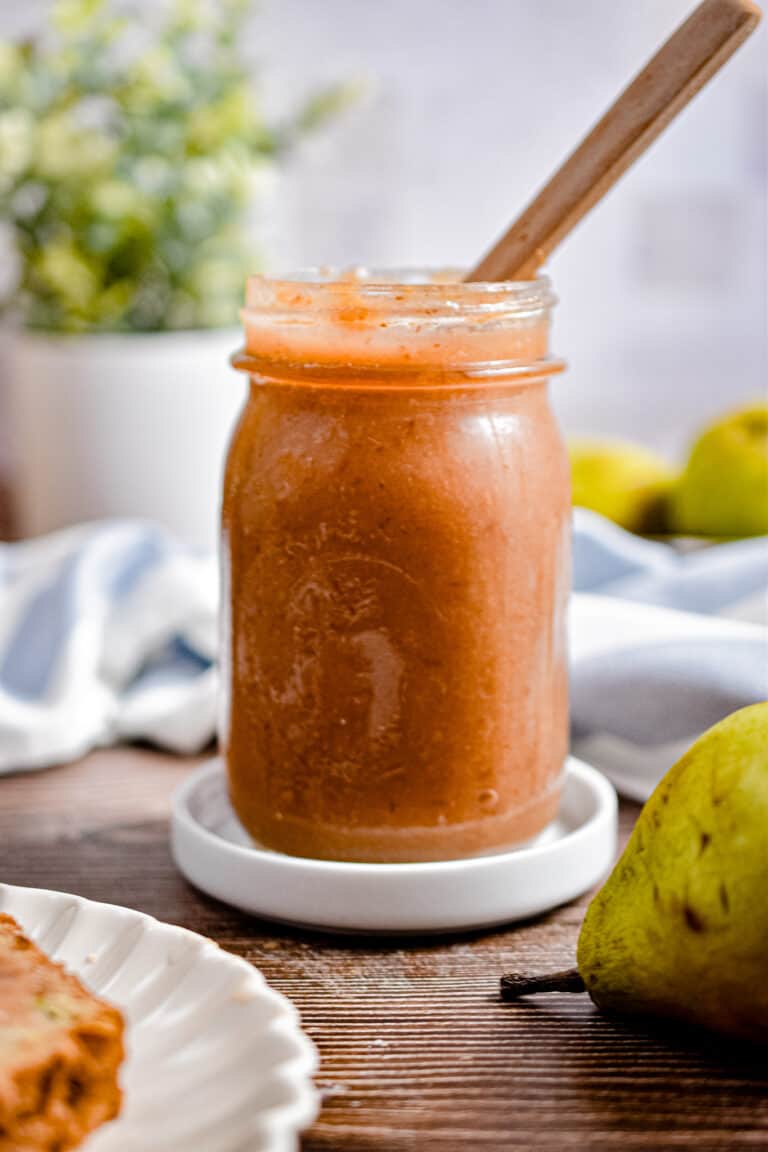 A straight on shot of the Instant Pot Pear Butter in a jar.