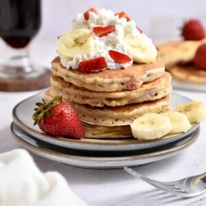 A straight on shot of the strawberry banana pancakes