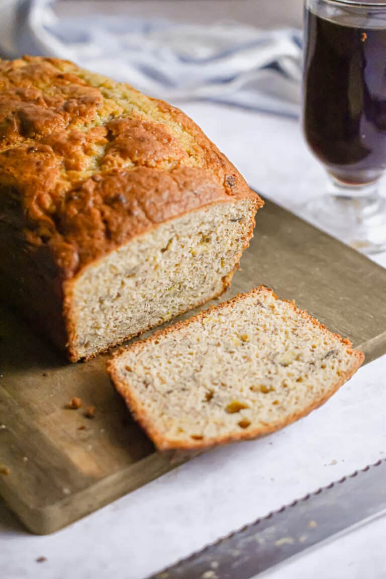 A side shot of a cut piece of cake mix banana bread.