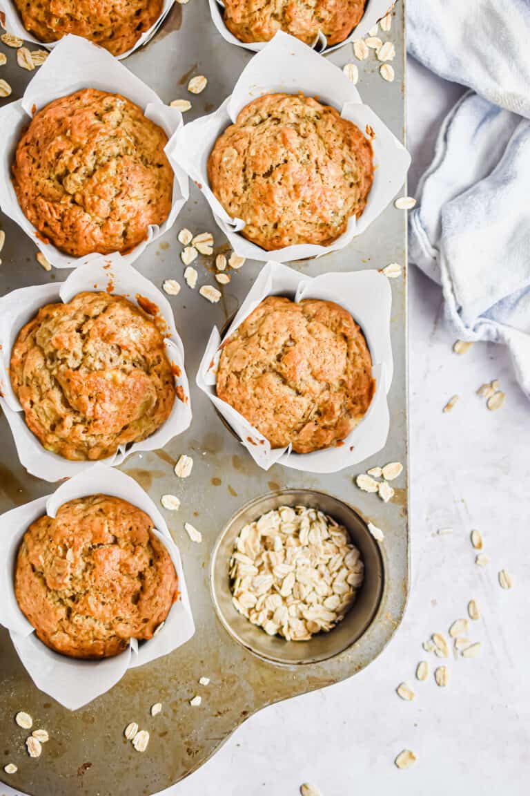An overhead shot of the muffins in a muffin tin.