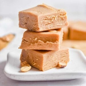 three pieces of peanut butter fudge are stacked together