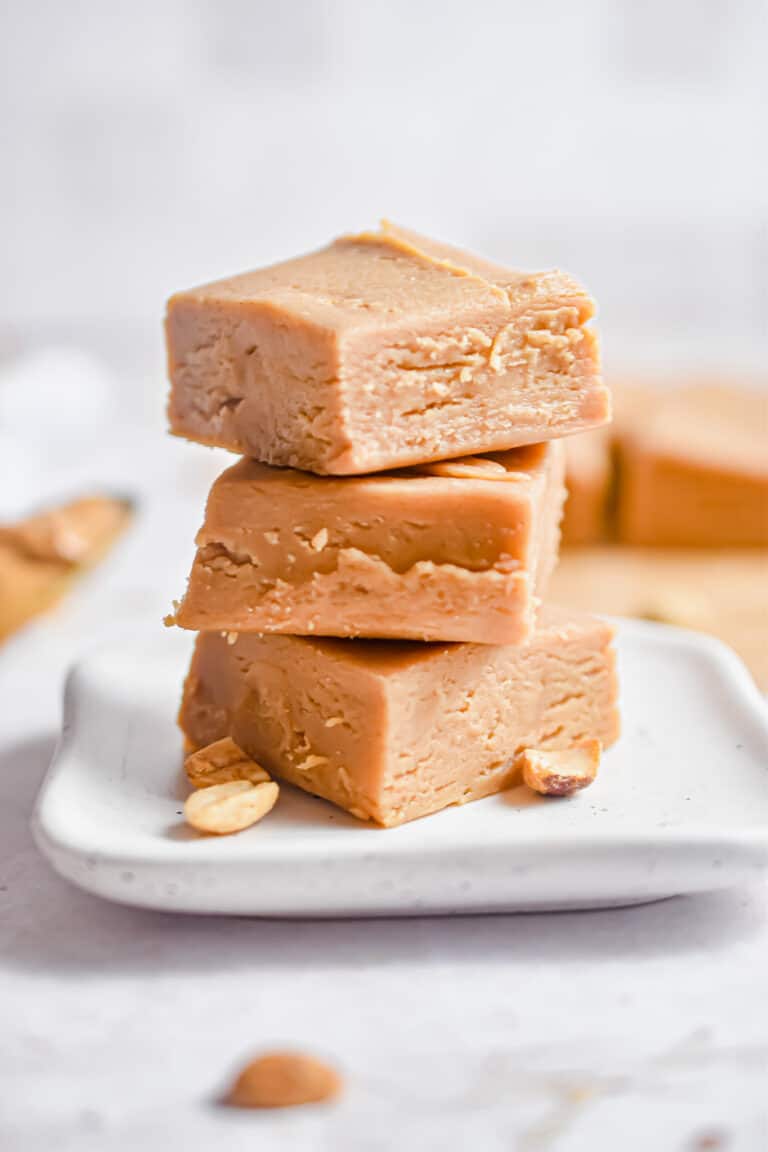 three pieces of peanut butter fudge are stacked together