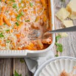 A portion of the 5 ingredient baked ziti is placed onto a plate.