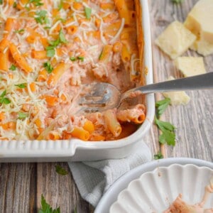 A portion of the 5 ingredient baked ziti is placed onto a plate.
