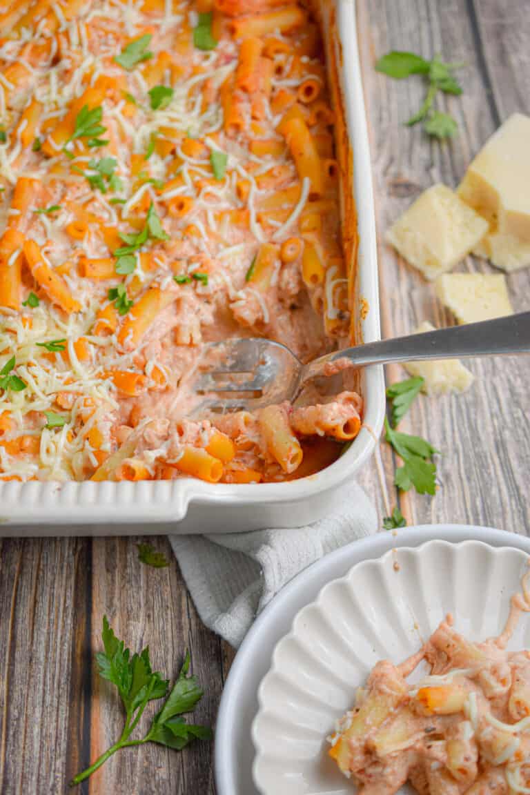 A portion of the 5 ingredient baked ziti is placed onto a plate.