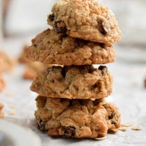 Four oatmeal cookies with self rising flour are stacked.