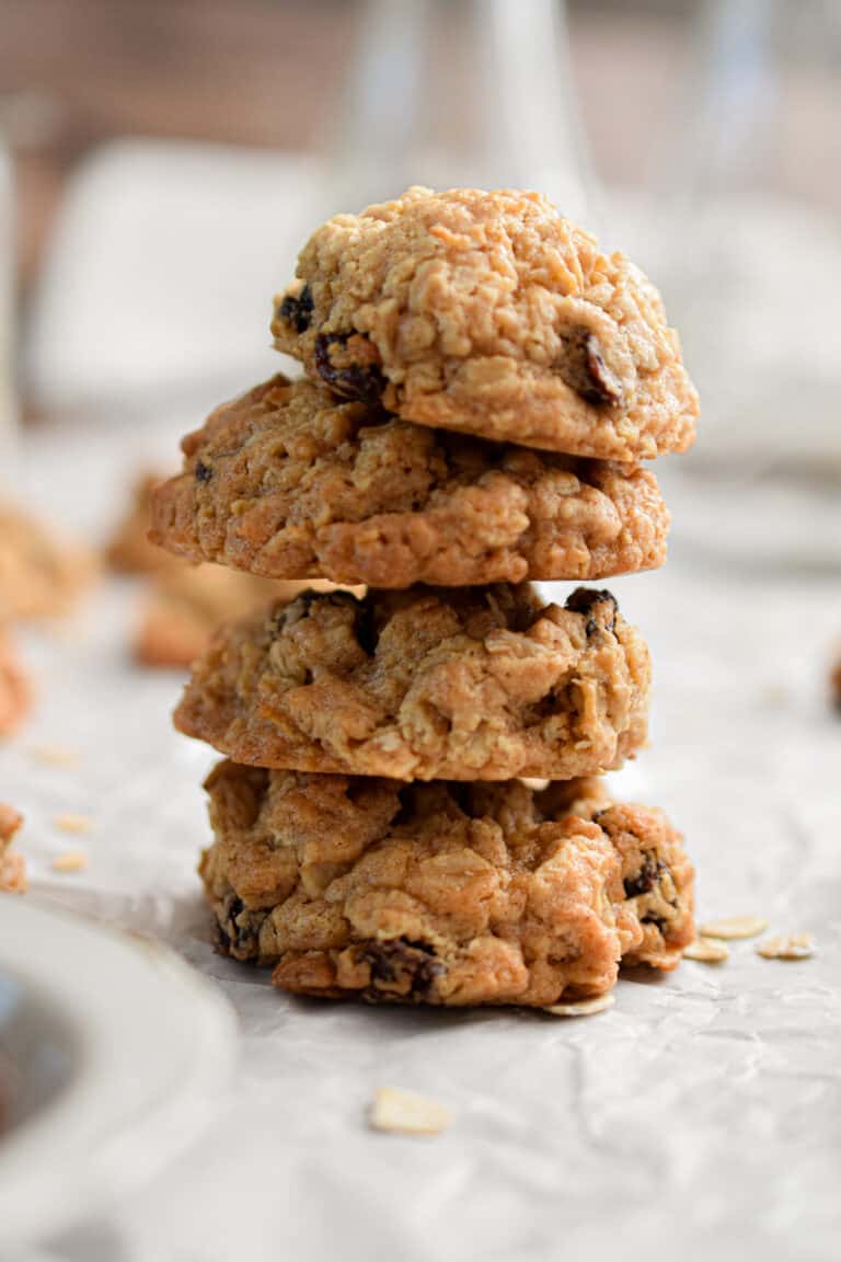 Four oatmeal cookies with self rising flour are stacked.