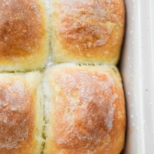 The sourdough discard dinner rolls are in a baking dish.