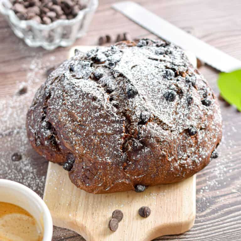 The double chocolate sourdough bread is sprinkled with powdered sugar.