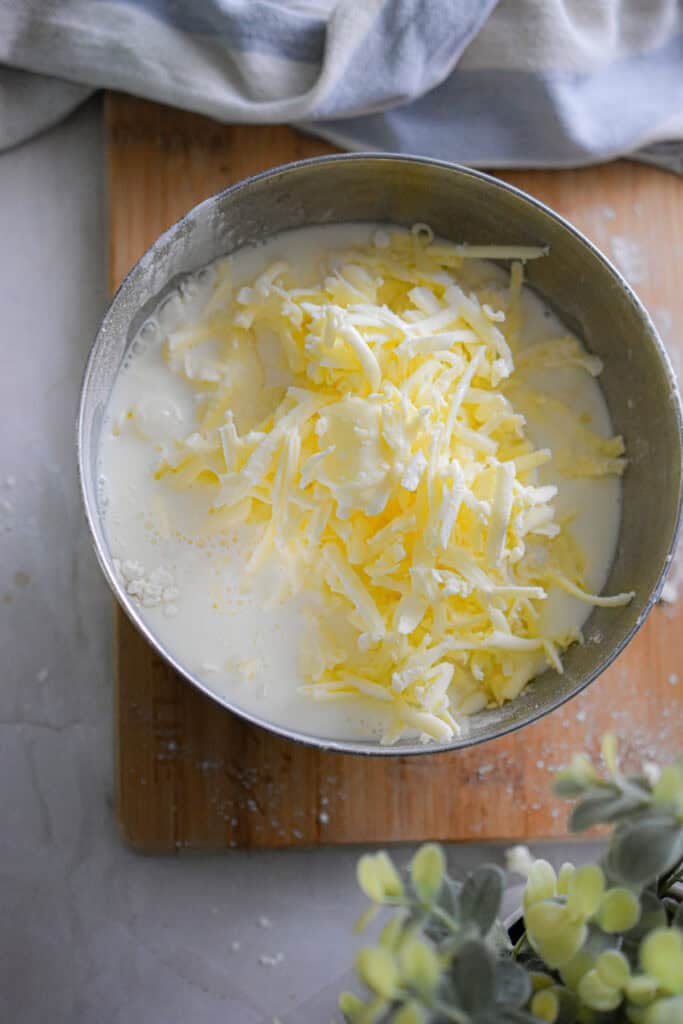 The milk is added to the bowl.