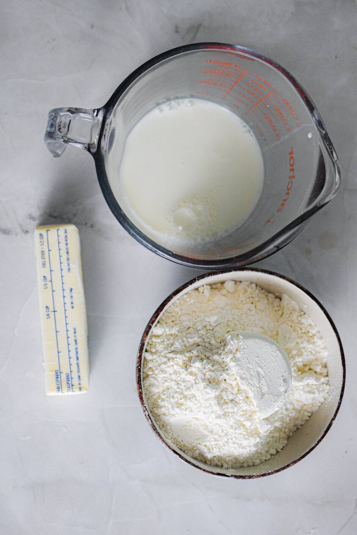 The ingredients for the self rising flour biscuits are laid out.