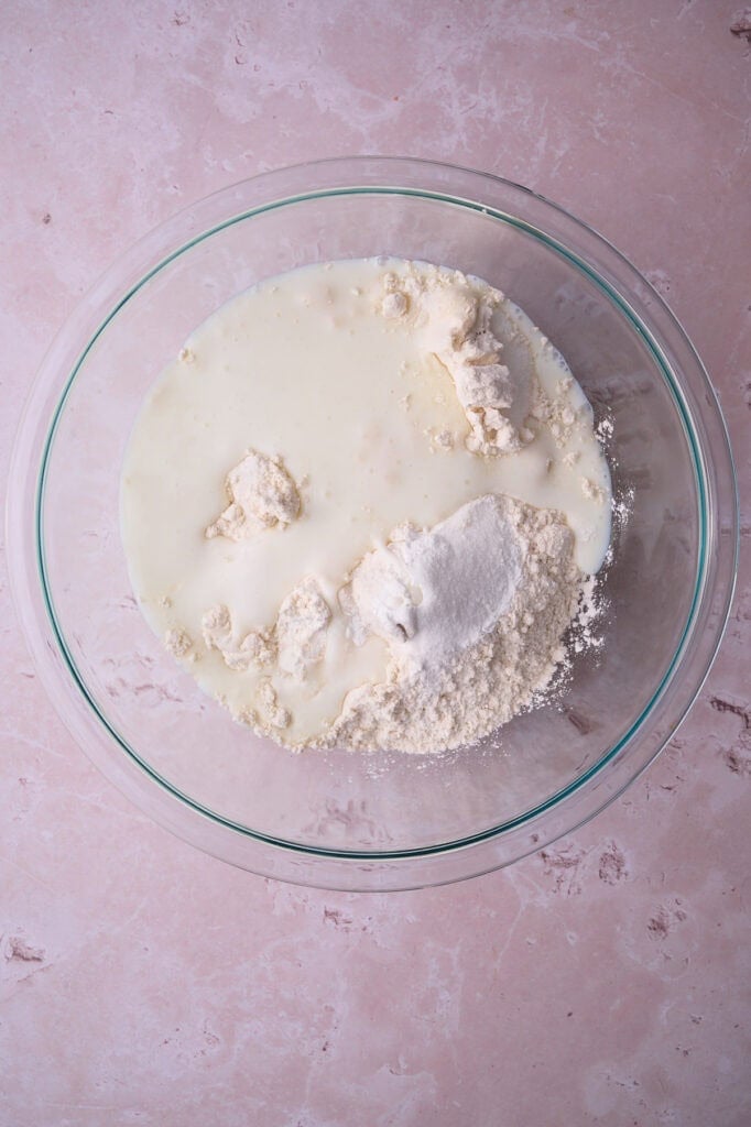 The buttermilk is added to the bowl.