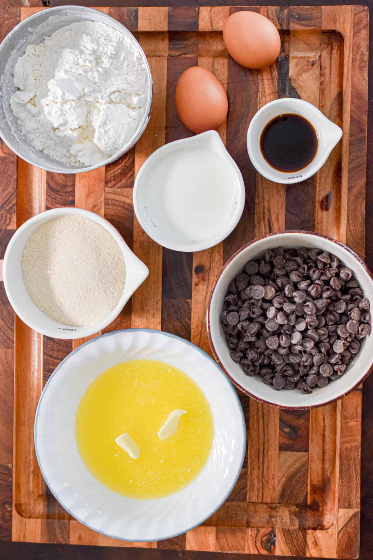 The ingredients for the chocolate chip muffins with self rising flour are laid out.