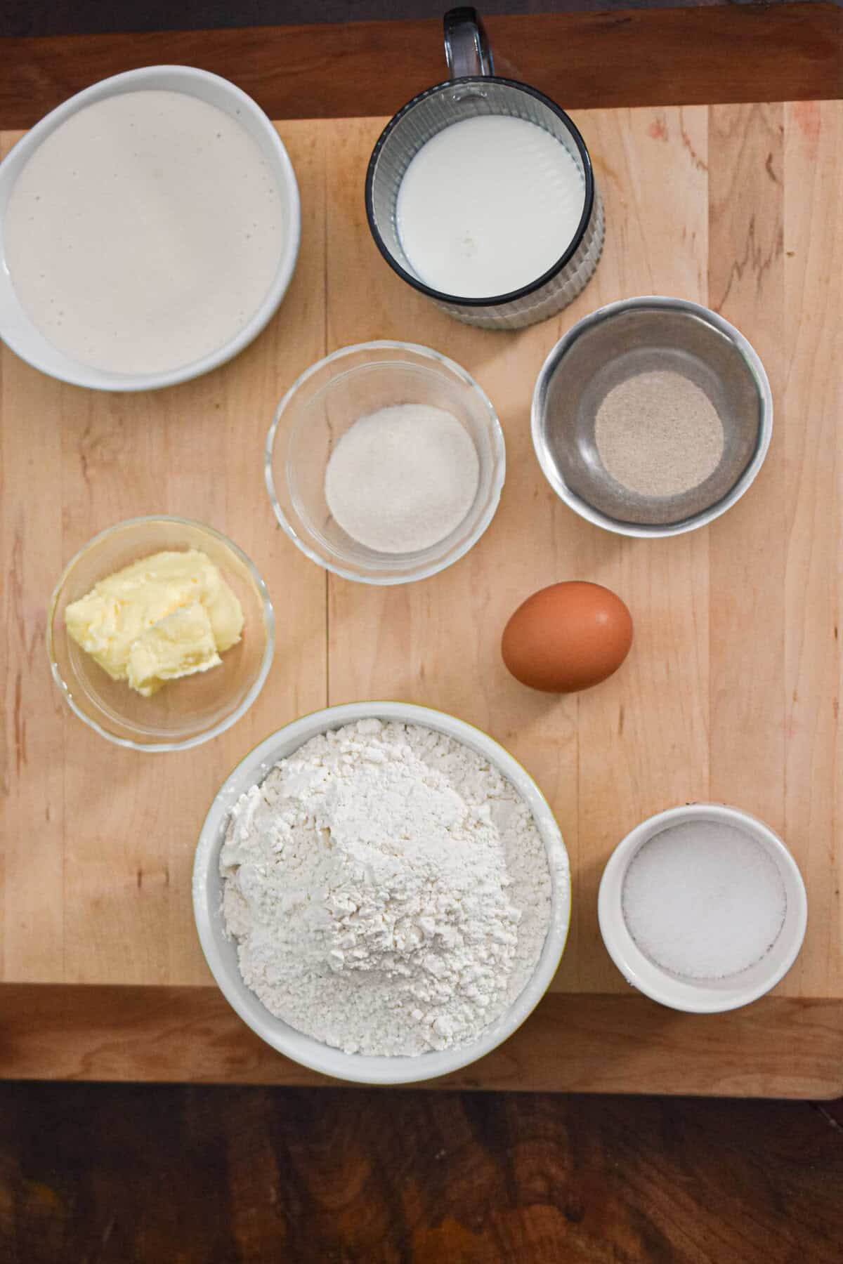 The ingredients for the sourdough discard hamburger buns are laid out.