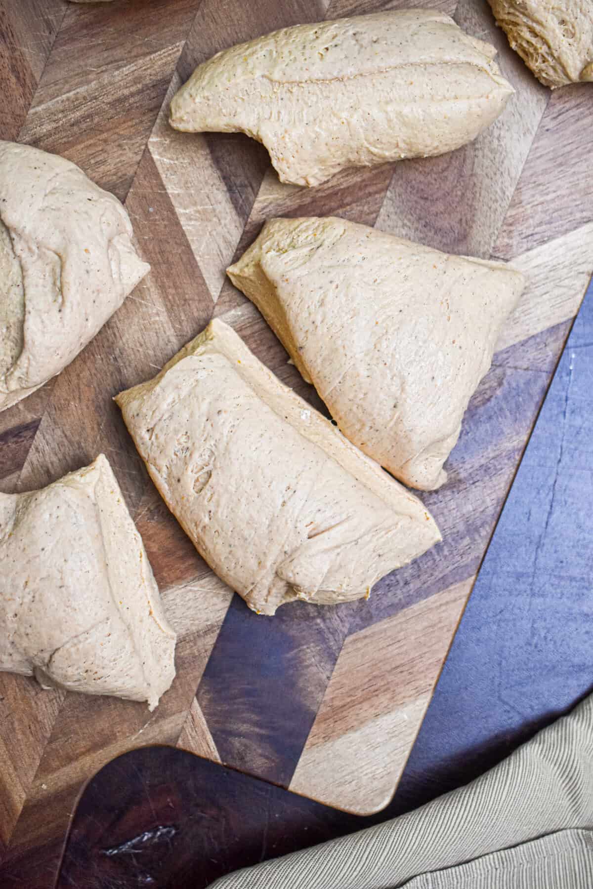 The pieces of the dough are cut and ready to be shaped.
