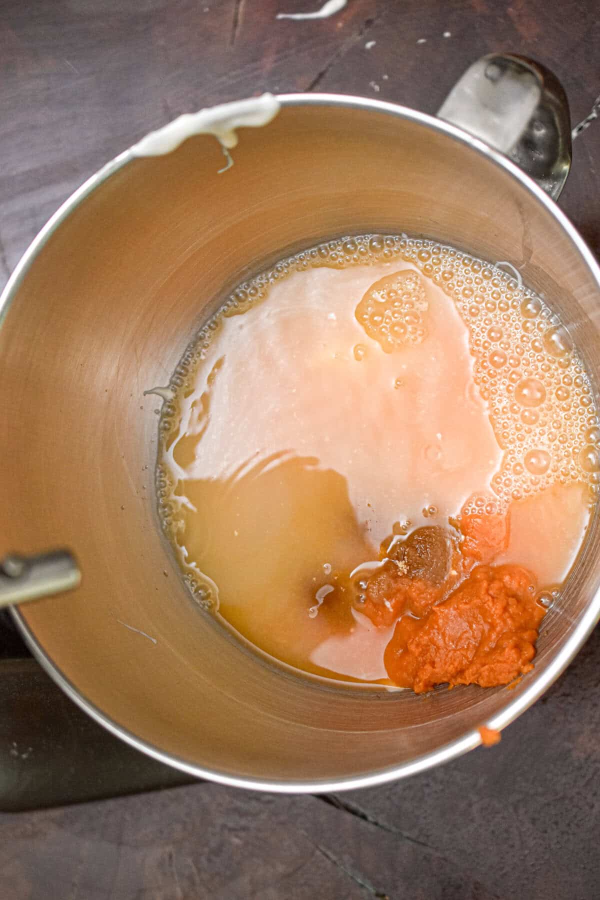 The wet ingredients are added to the bowl.