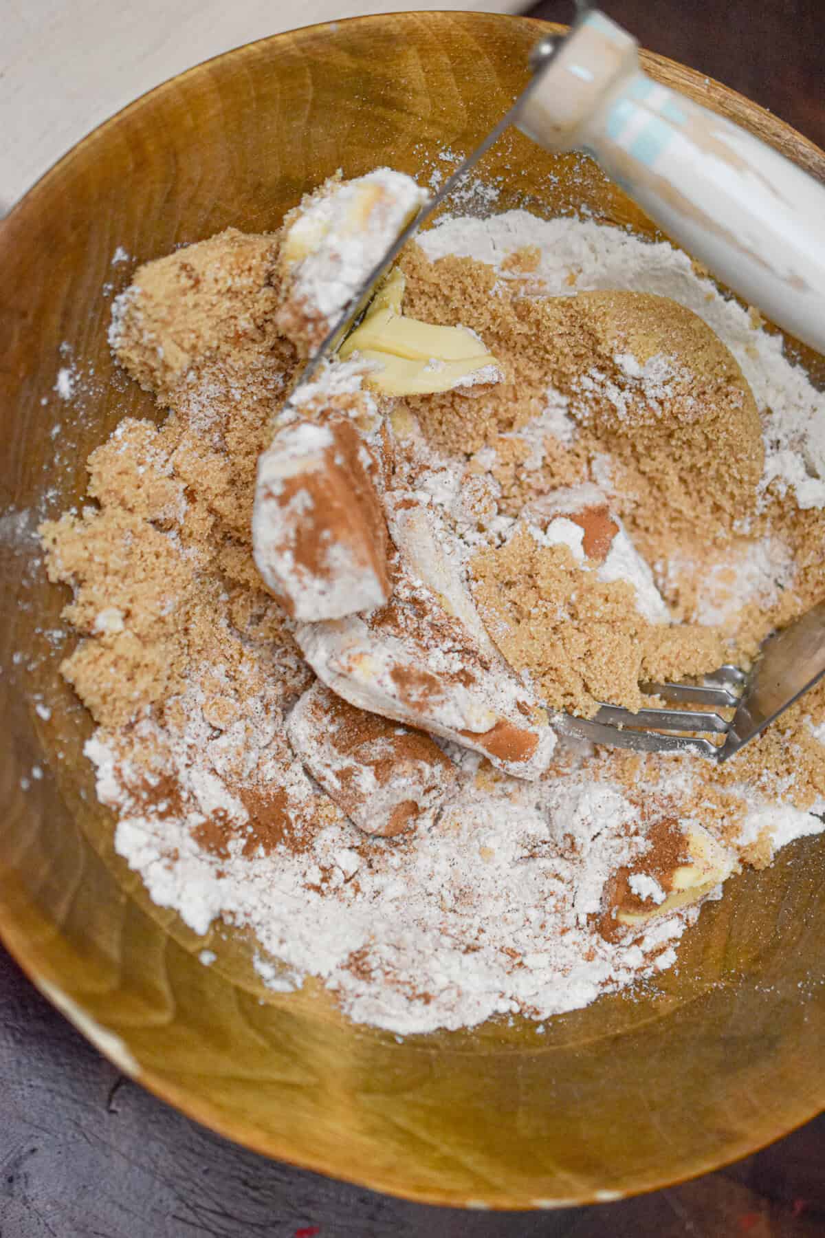 The crumb is made in a wooden bowl.