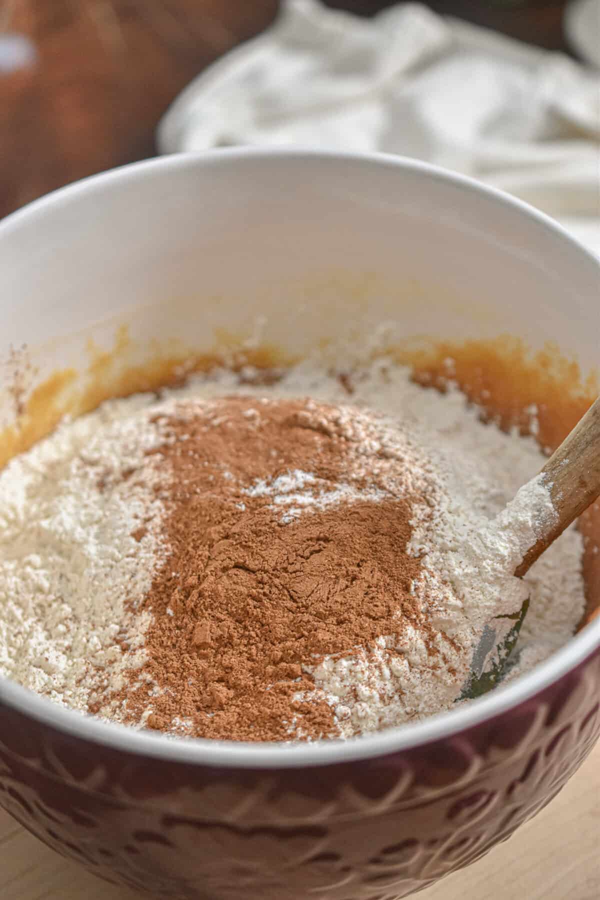The dry ingredients are added to the mixing bowl.